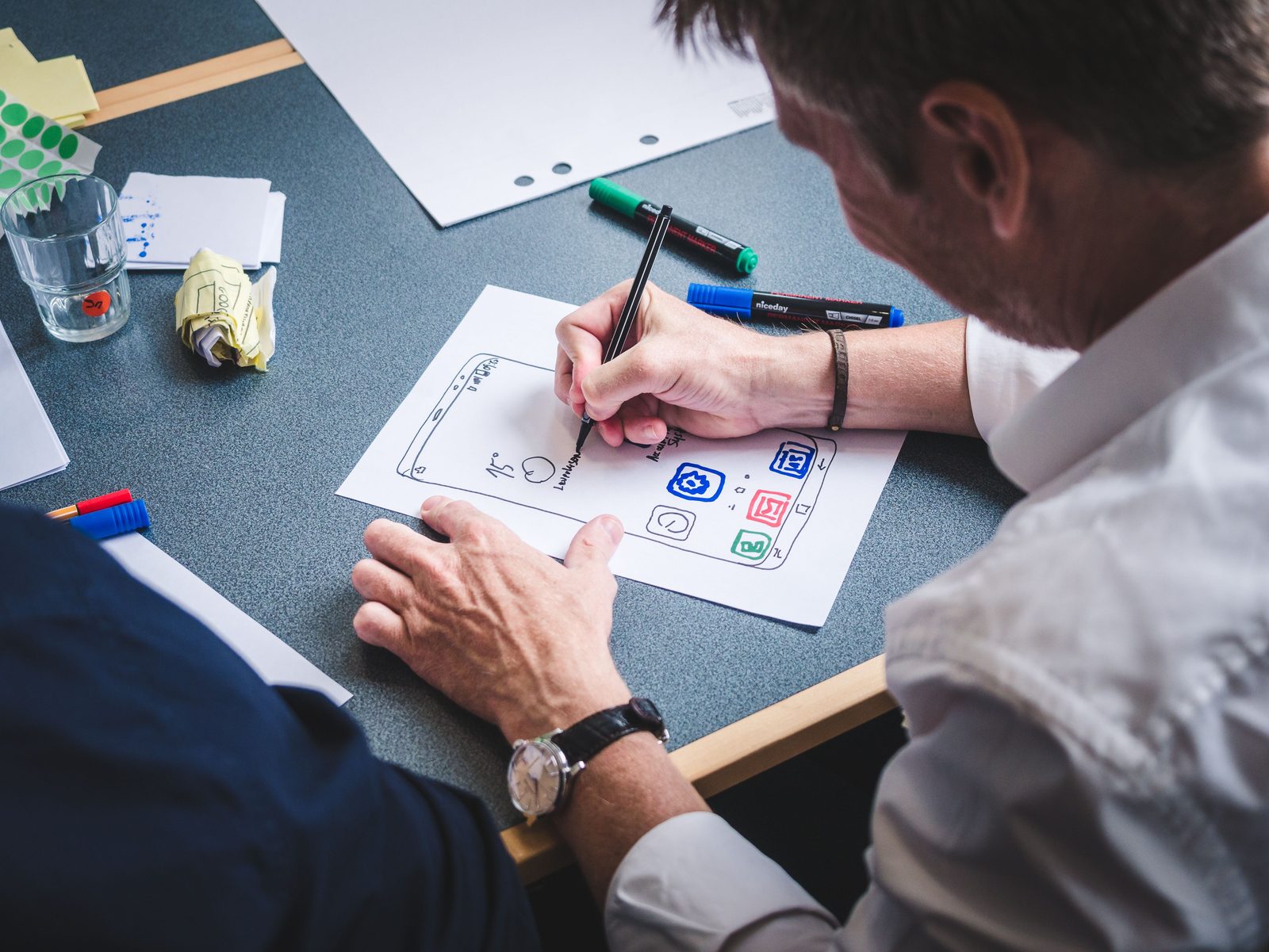 A mobile application concept being sketched during product design