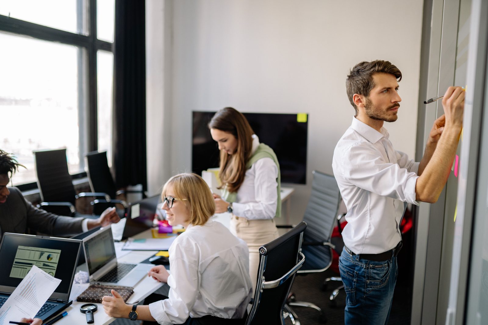 A professional team collaborating in a modern workspace