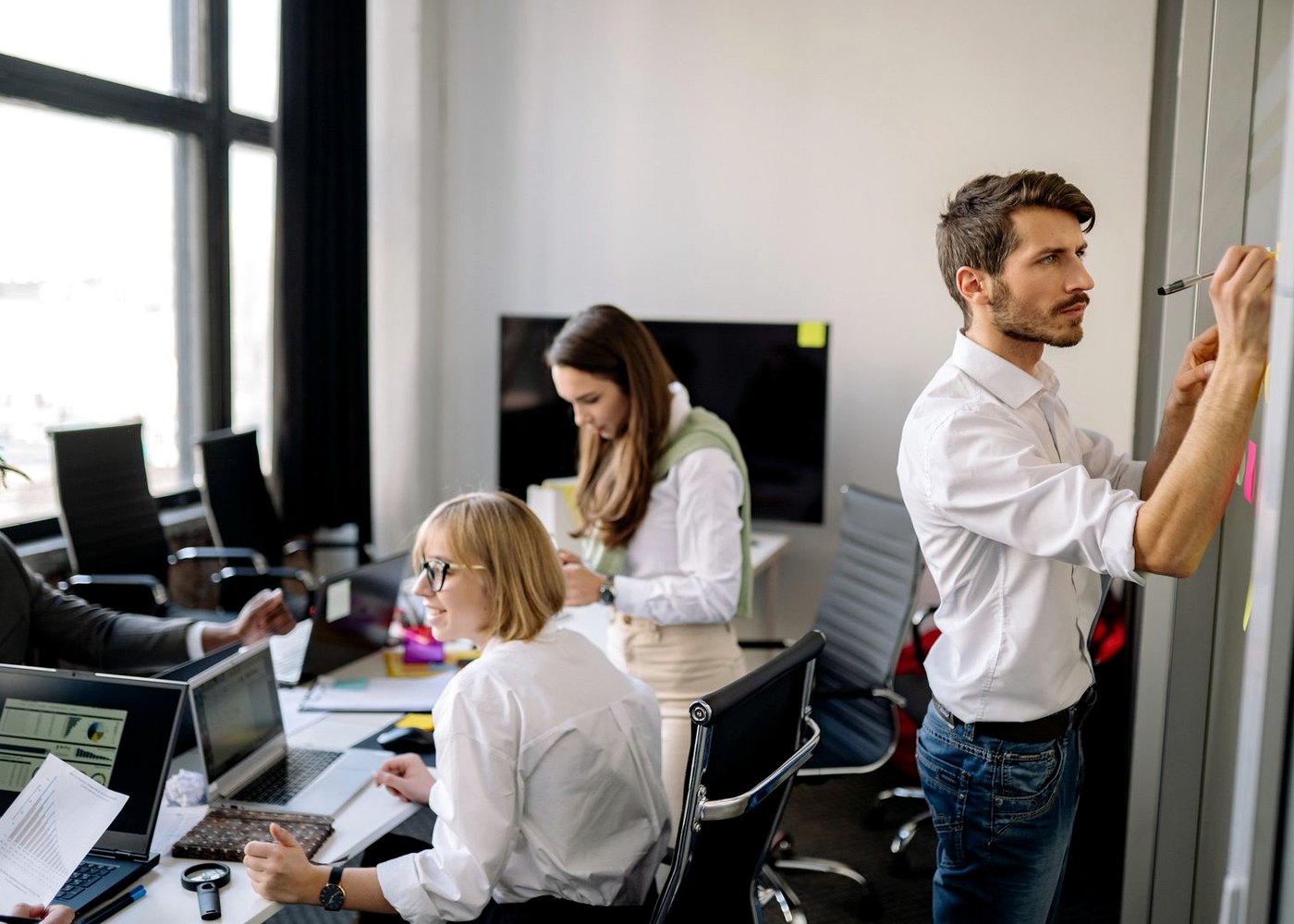 Product team collaborating on a responsive web platform